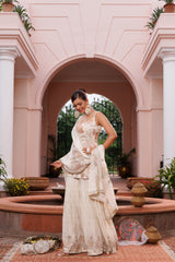 Hand embroidered short shirt and sharara set with dupatta, embellished with beads, cutdana, and sequins.