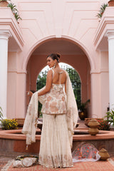 Hand embroidered short shirt and sharara set with dupatta, embellished with beads, cutdana, and sequins.