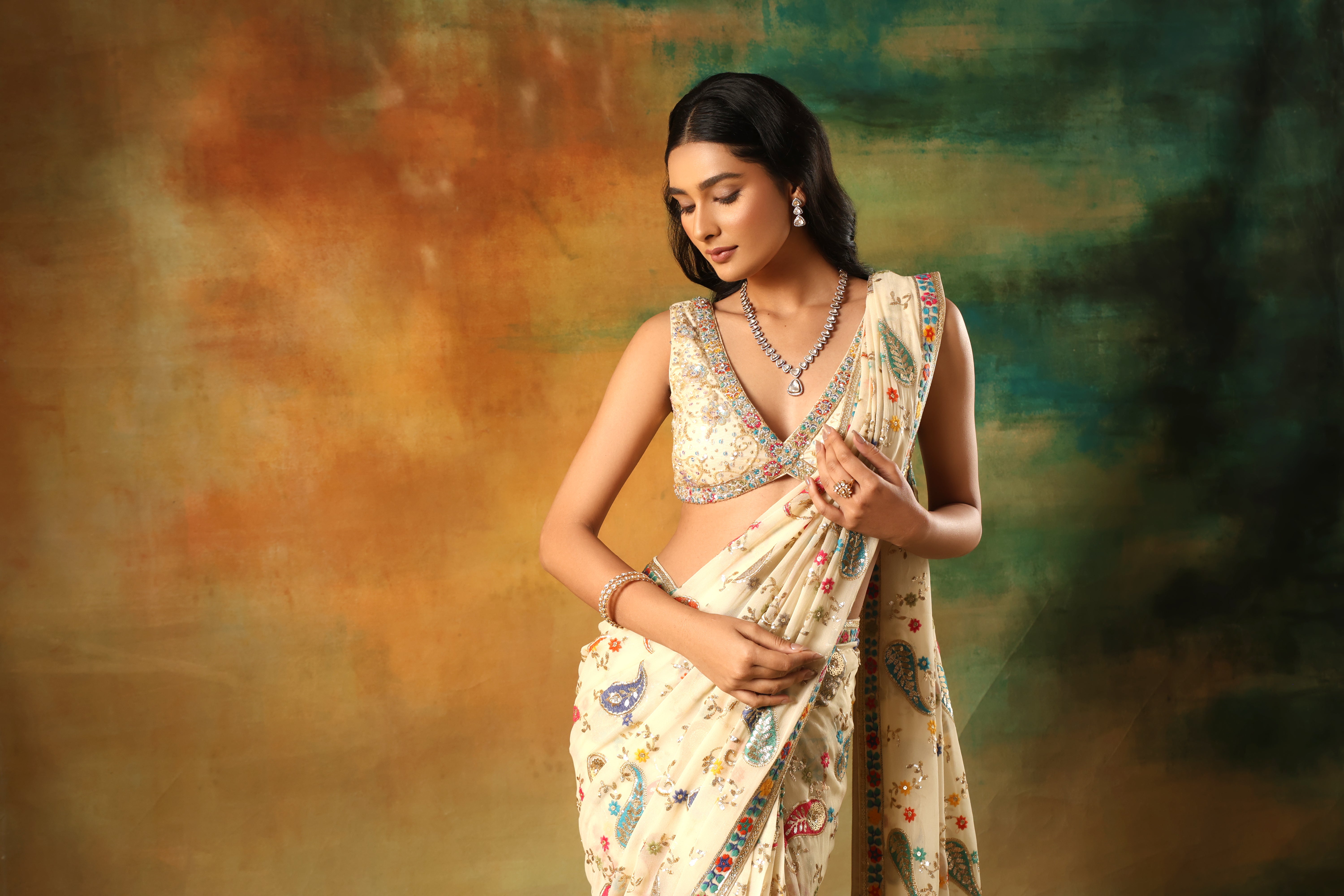 Ivory Embroidered Saree with Embellished Blouse