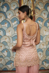 Peachy Pink tissue gharara with a honeybee jaal & sequin embellishments.