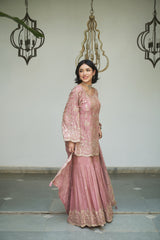 Lavender floral jaal gharara adorned with delicate sequin embellishments.
