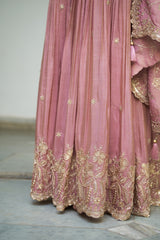 Lavender floral jaal gharara adorned with delicate sequin embellishments.
