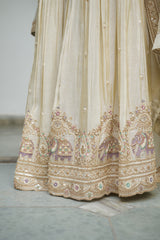 A Yellow tissue with sequin, bead, resham & moti nature-inspired embellishments.