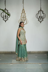 Sage green tissue with sequin, bead, resham & moti nature-inspired embellishments.