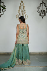 Sage green tissue with sequin, bead, resham & moti nature-inspired embellishments.