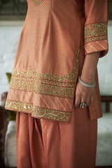 Rusty silk gharara set with sequin, zari & beadwork.