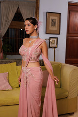 Exquisite pastel drape saree adorned with floral details, sparkling beads, and elegant bridal charm.