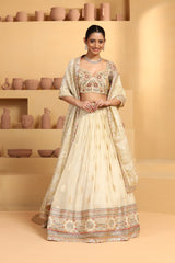 Nakshi, sequin cutdana resham mixed hand crafted choli plus Tissue jacquard lehenga with border
