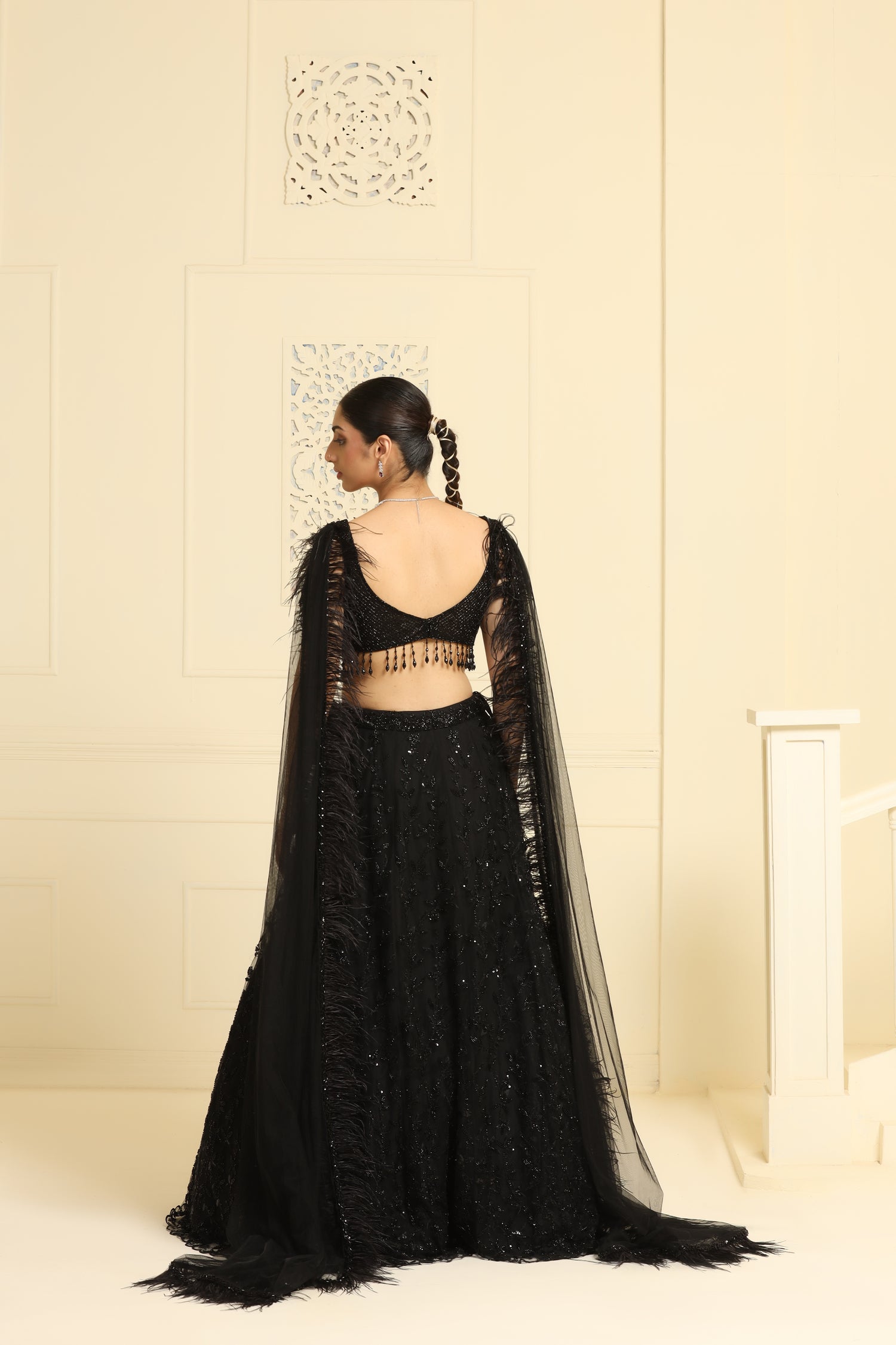 Flower kalidar lehenga and geomatric cutdana work on choli and feather dupatta