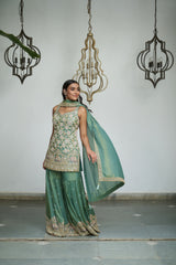 Sage green tissue with sequin, bead, resham & moti nature-inspired embellishments.